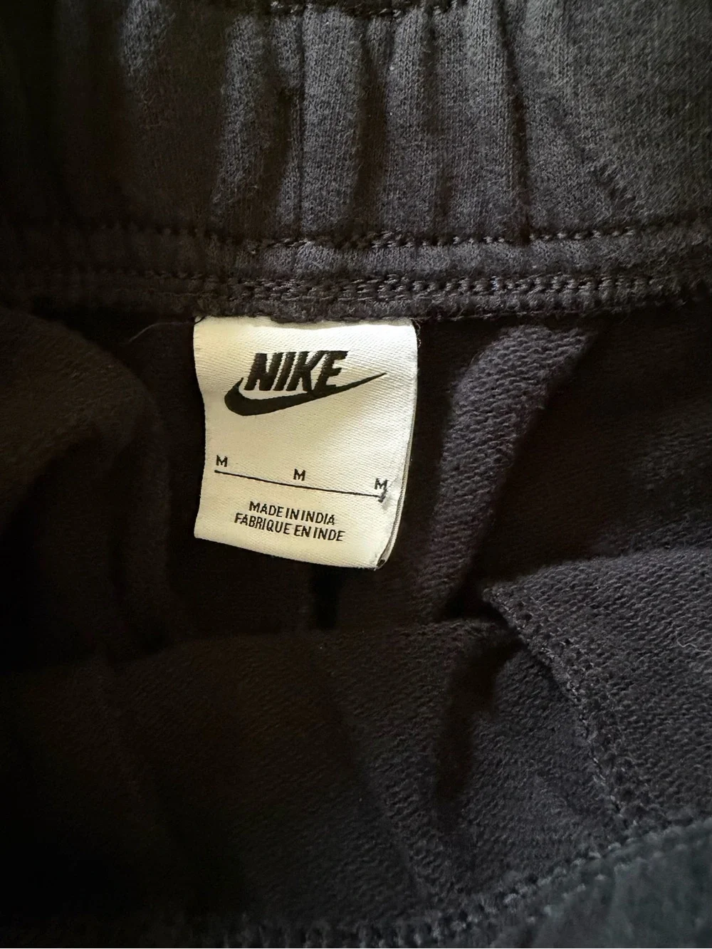 Nike Black Jogger Sweatpants with White Swoosh